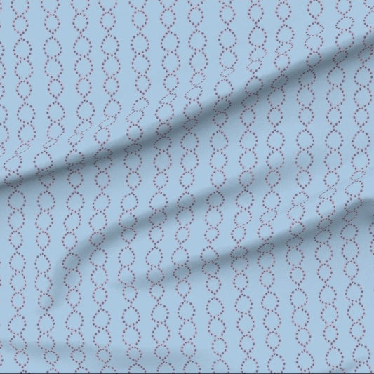 Fabric with a subtle water drop chain golgi apparatus pattern on a light blue background