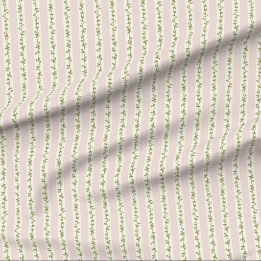 boutique home decor Fabric with small hand drawn floral vine on a pink background