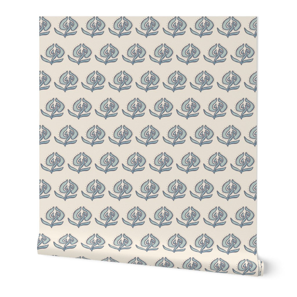 Patterned wallpaper with blue designs on a beige background